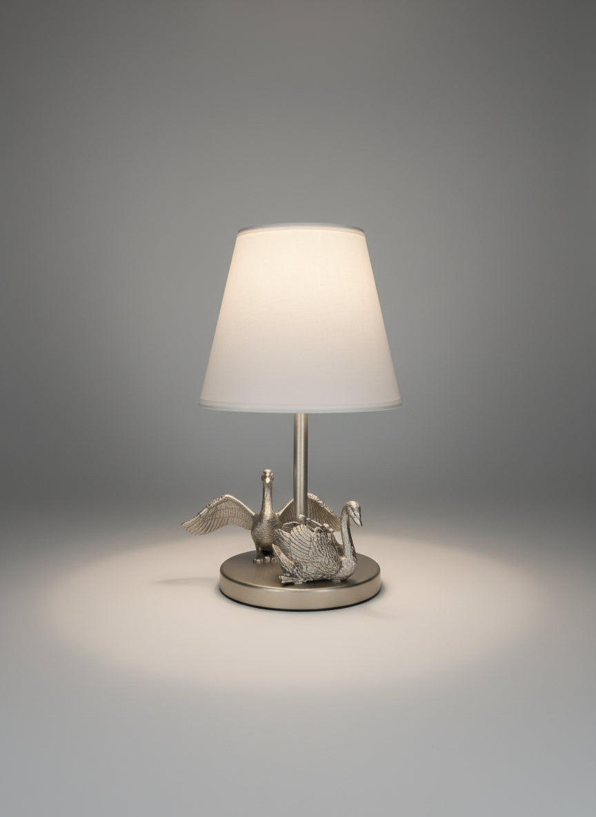 Kinderlampe held in wings of light